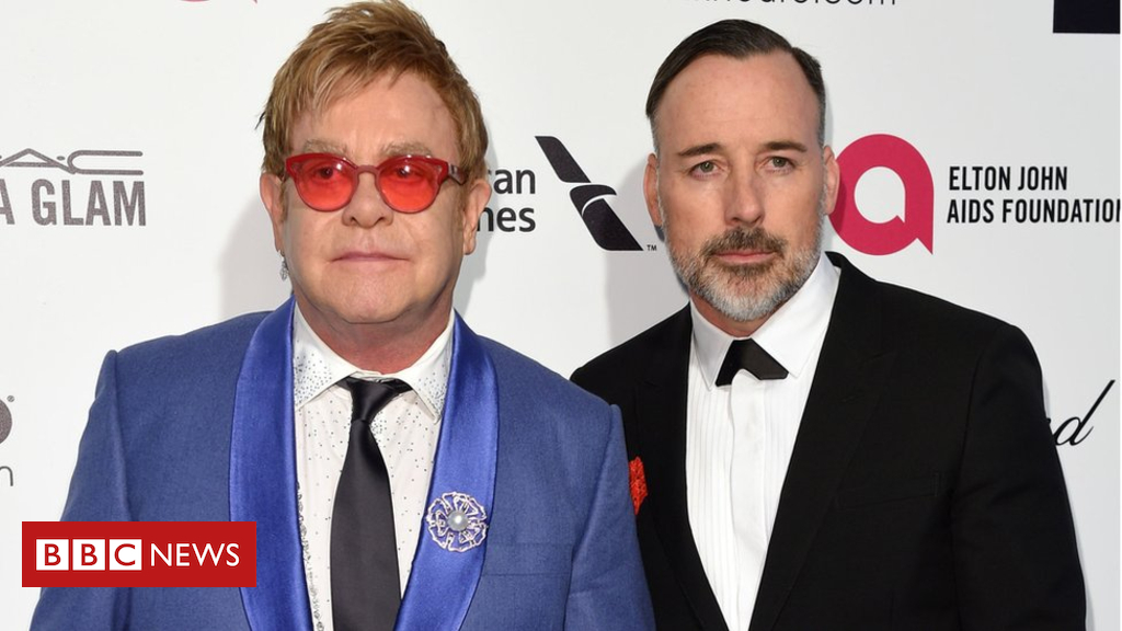 Phone-hacking: Sir Elton John and Elizabeth Hurley settle claims - BBC News